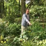 Jimi Blake pointing out plant treasures in his garden, Hunting Brook.