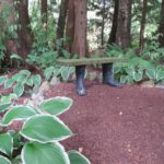 Bench with wellington boot feet