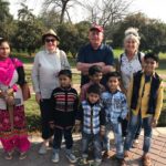 With an Indian famly visiting the Lotus Temple in New Delhi